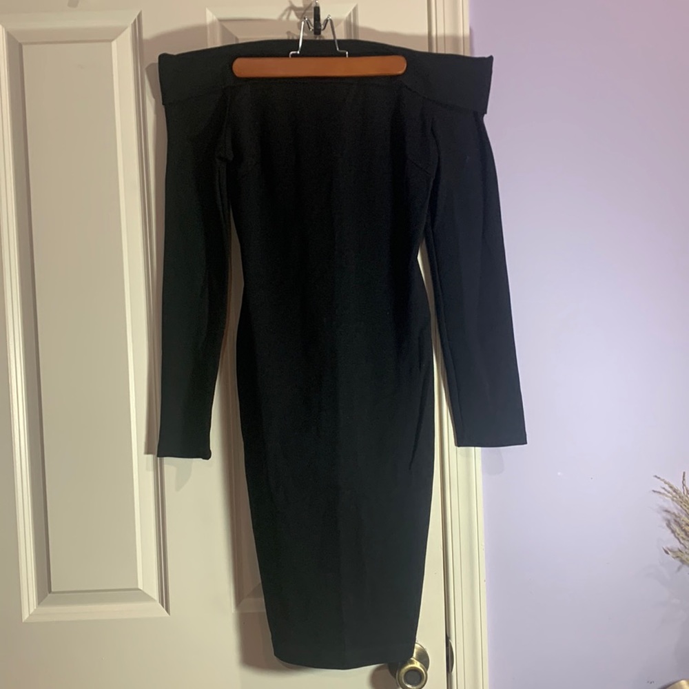Off shoulder black formal dress.